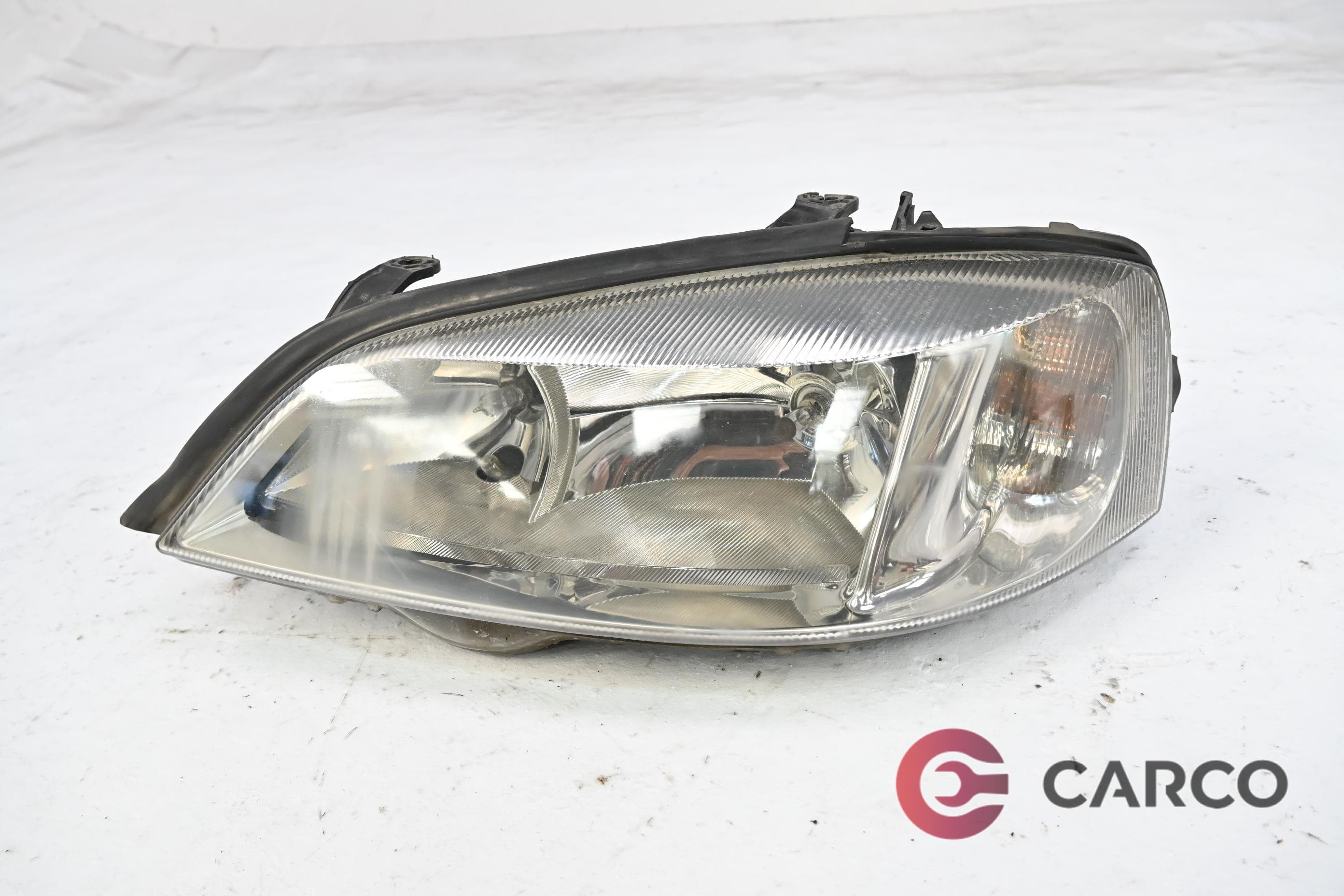 Фар ляв 1EG 007 640 за OPEL ASTRA G седан (F69_) 1.7 TD (1998 - 2009)